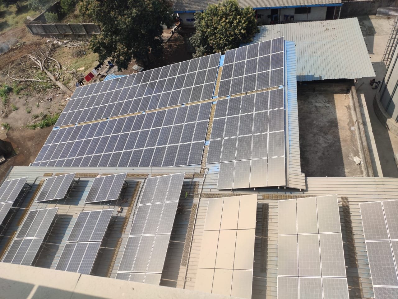 Aerial view of a completed Prayosha Solar rooftop plant